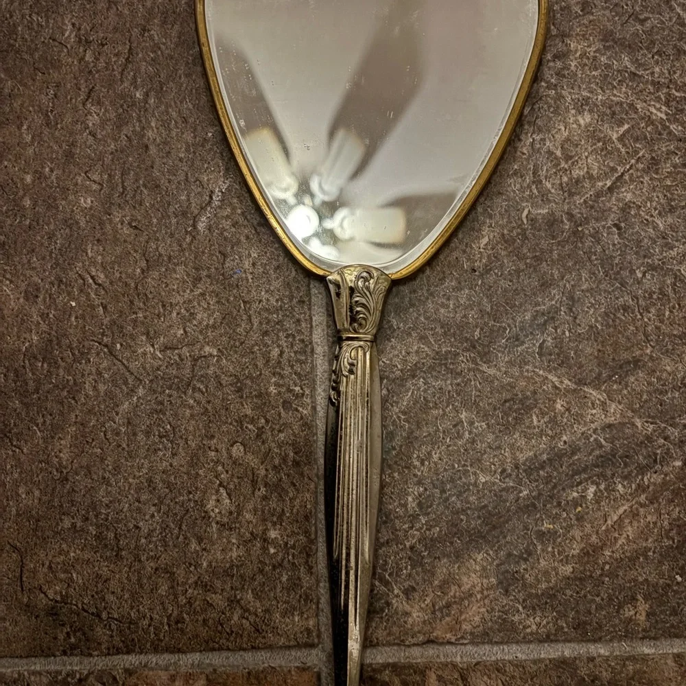 Vintage Handheld Mirror with Gold Accents